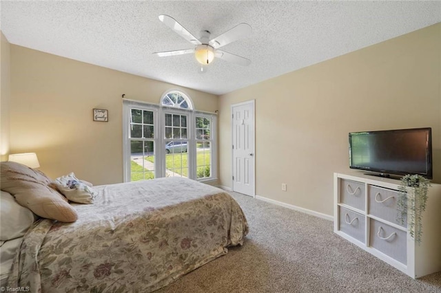 4012 Clarendon Ave, Winston-Salem, NC 27106 - bedroom with a textured ceiling, carpet floors, a ceiling fan, and a closet