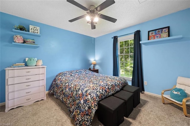 4012 Clarendon Ave, Winston-Salem, NC 27106 - carpeted bedroom with a textured ceiling and ceiling fan