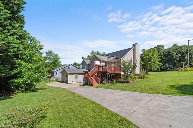 4012 Clarendon Ave, Winston-Salem, NC 27106 - view of front of house featuring driveway, a wooden deck, a front yard, stairway, and a chimney