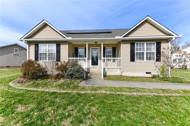 single story home with a porch, a front yard, roof mounted solar panels, and crawl space