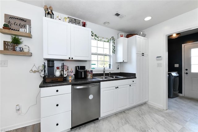 kitchen with a sink, visible vents, dishwasher, and white cabinets