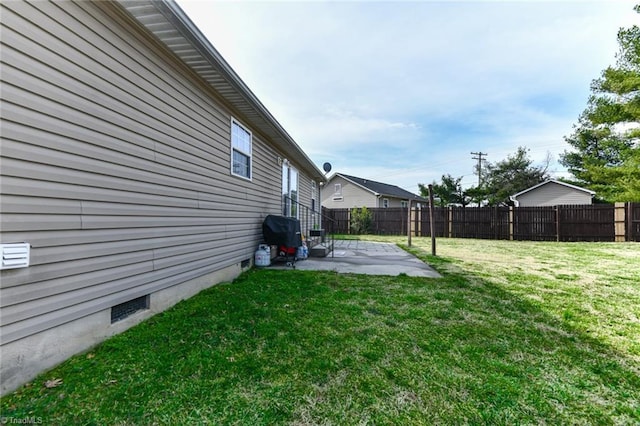 view of yard with fence and a patio area