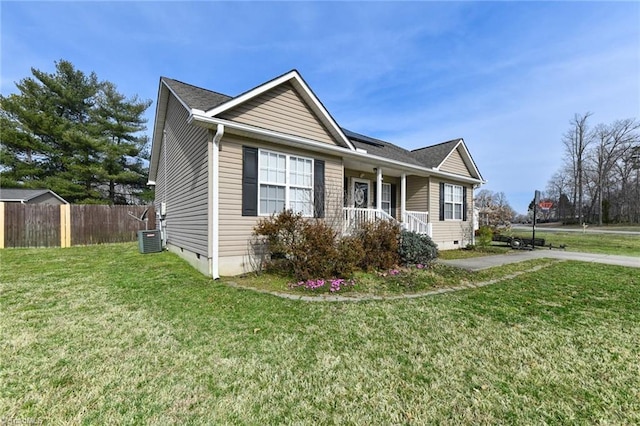 view of front of home featuring cooling unit, fence, covered porch, a front lawn, and crawl space