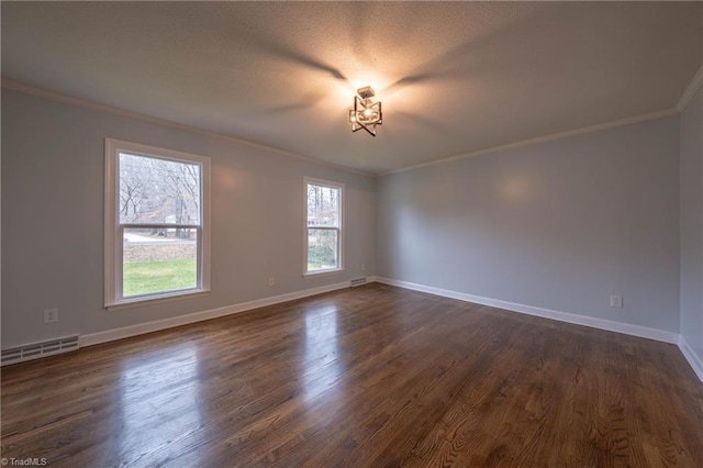 unfurnished room with dark wood-type flooring and crown molding