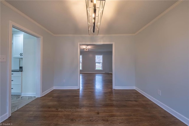 unfurnished room featuring crown molding and dark hardwood / wood-style floors