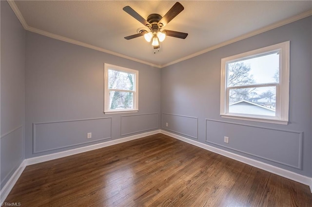 unfurnished room featuring crown molding, ceiling fan, and dark hardwood / wood-style floors