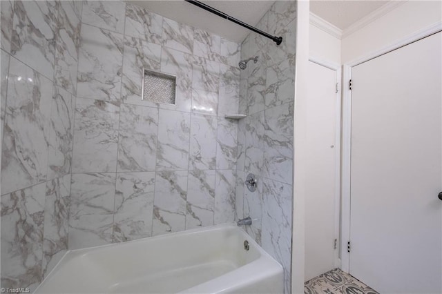 bathroom featuring tiled shower / bath and ornamental molding