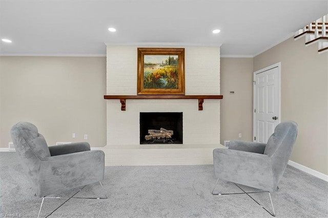 living room featuring carpet, a fireplace, baseboards, and crown molding