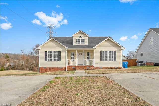 view of front of property with a front lawn and a porch