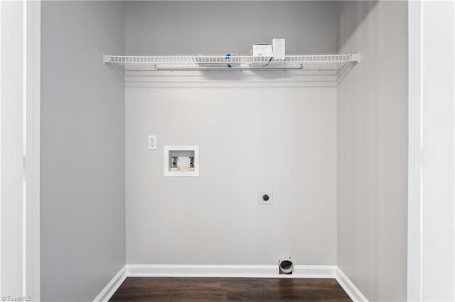 washroom featuring hookup for a washing machine, dark hardwood / wood-style flooring, and electric dryer hookup