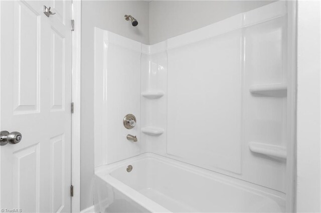 bathroom with shower / bathing tub combination