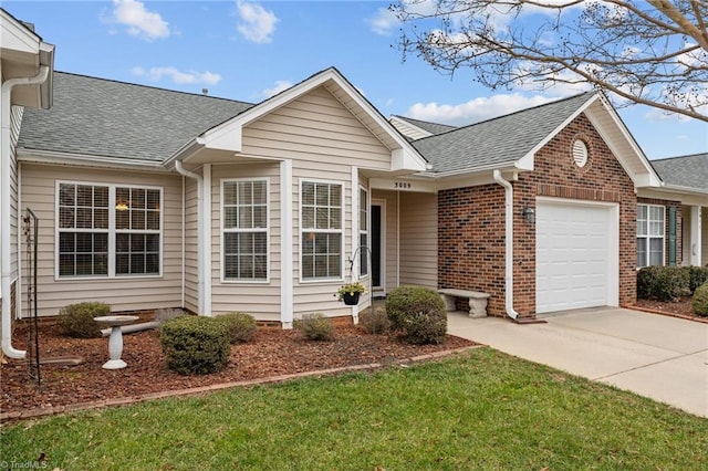 ranch-style house with a garage and a front lawn