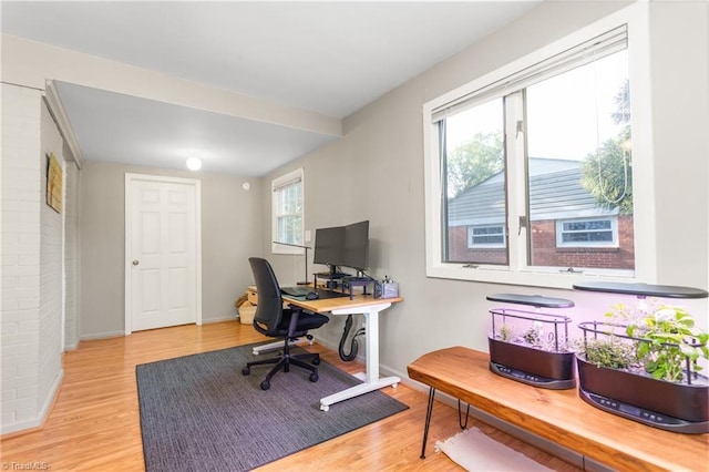 2909 Shamrock Dr, Greensboro, NC 27408 - office area with light wood-type flooring and baseboards