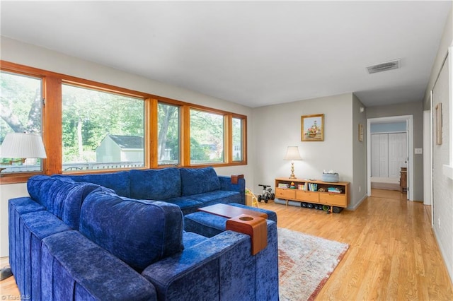 2909 Shamrock Dr, Greensboro, NC 27408 - living room with light wood-style flooring and baseboards