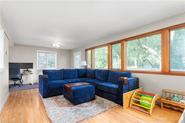 2909 Shamrock Dr, Greensboro, NC 27408 - living room with plenty of natural light, wood finished floors, an office area, and ceiling fan