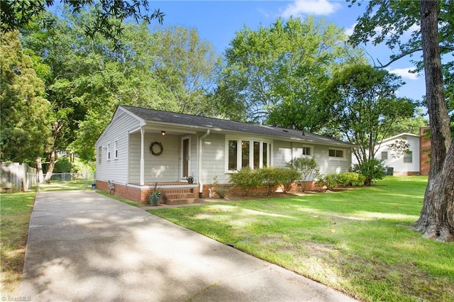 2909 Shamrock Dr, Greensboro, NC 27408 - view of front of property featuring driveway, crawl space, and covered porch