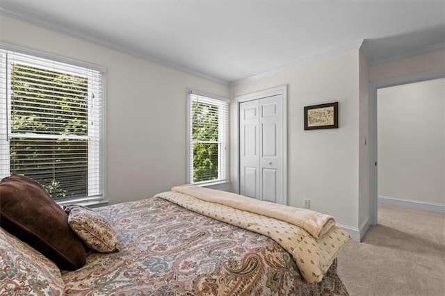 1608 Fox Hollow Rd, Greensboro, NC 27410 - carpeted bedroom with ornamental molding and a closet