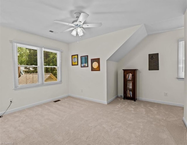 1608 Fox Hollow Rd, Greensboro, NC 27410 - additional living space with light colored carpet and ceiling fan