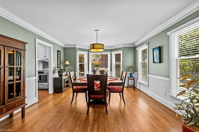 1608 Fox Hollow Rd, Greensboro, NC 27410 - dining space with wood finished floors and ornamental molding