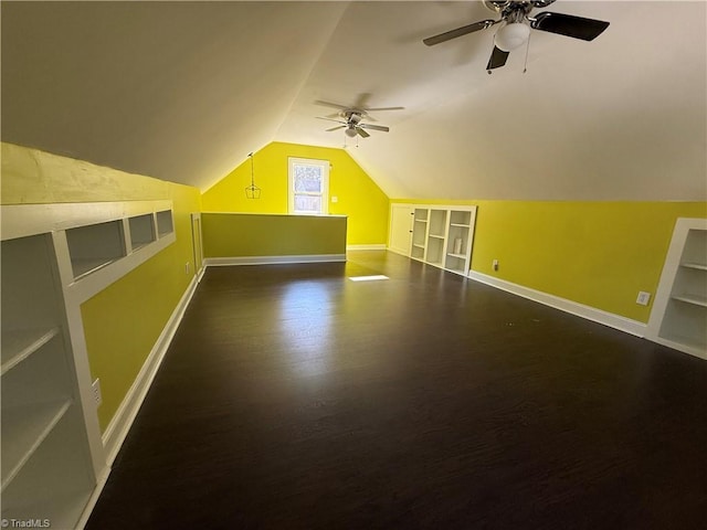 1608 Fox Hollow Rd, Greensboro, NC 27410 - bonus room featuring built in features, ceiling fan, vaulted ceiling, and wood finished floors