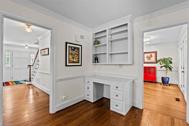 1608 Fox Hollow Rd, Greensboro, NC 27410 - unfurnished office featuring built in study area, dark wood-type flooring, and crown molding