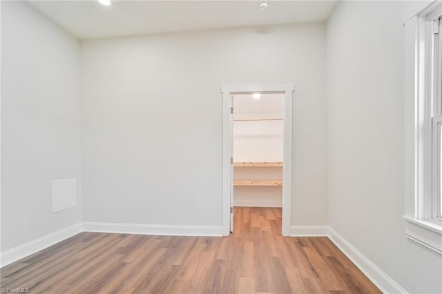 spare room with light wood-type flooring