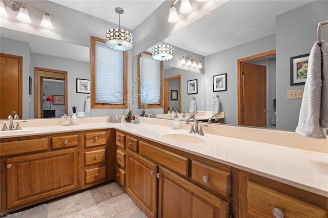 full bathroom featuring a sink and double vanity