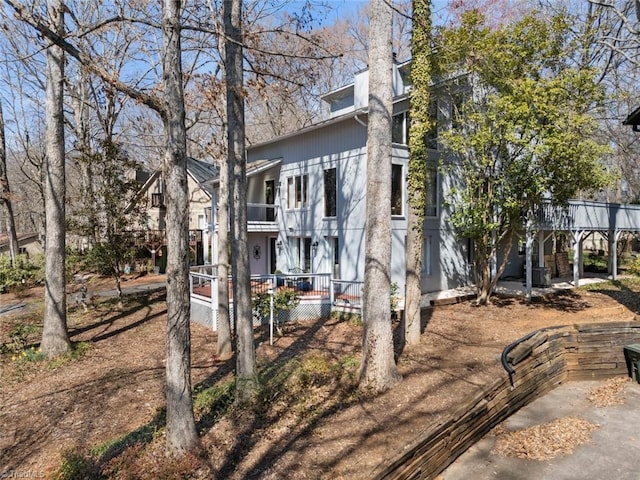 view of front of home with a balcony