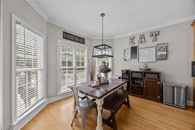 6089 Pleasant Field Dr, Greensboro, NC 27455 - dining space with light wood-type flooring, ornamental molding, and baseboards