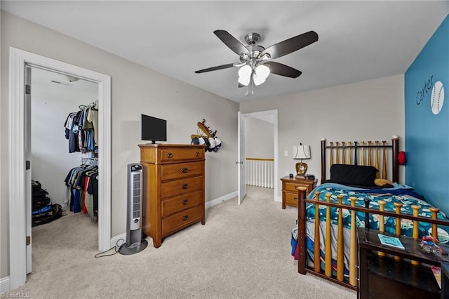 6089 Pleasant Field Dr, Greensboro, NC 27455 - carpeted bedroom featuring a closet, baseboards, ceiling fan, and a spacious closet