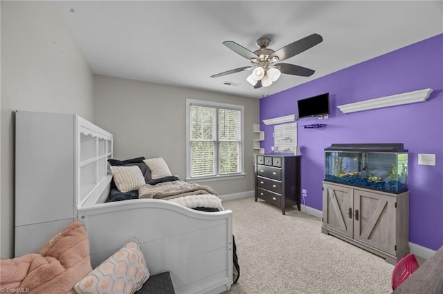 6089 Pleasant Field Dr, Greensboro, NC 27455 - carpeted bedroom featuring baseboards and a ceiling fan