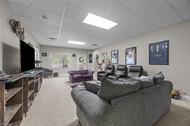 6089 Pleasant Field Dr, Greensboro, NC 27455 - carpeted living room featuring a paneled ceiling and baseboards
