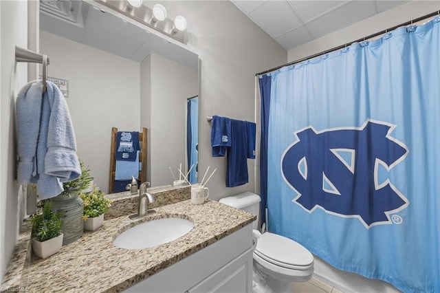 6089 Pleasant Field Dr, Greensboro, NC 27455 - full bathroom with toilet, vanity, a paneled ceiling, and shower / bathtub combination with curtain