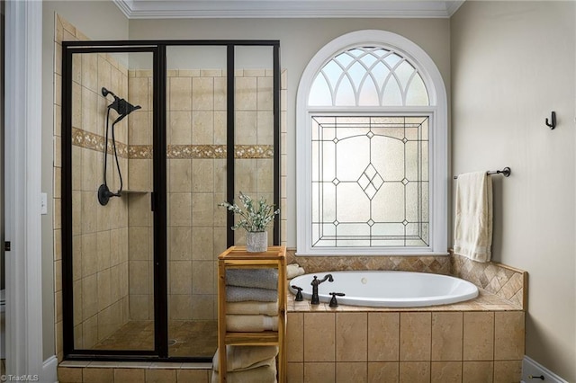 bathroom featuring ornamental molding and plus walk in shower