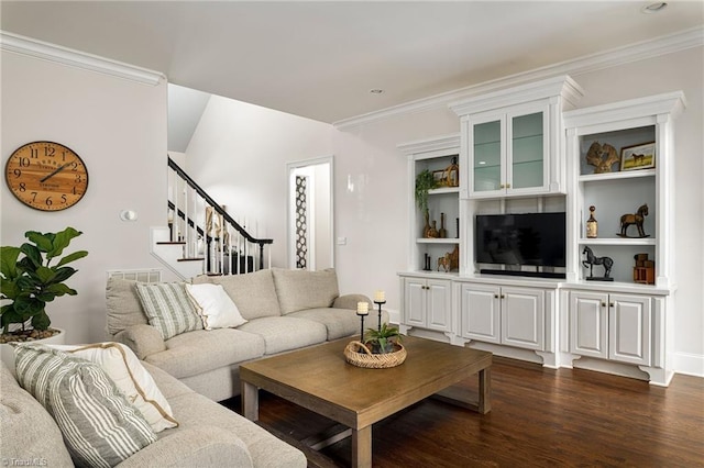 living room featuring ornamental molding and dark hardwood / wood-style floors