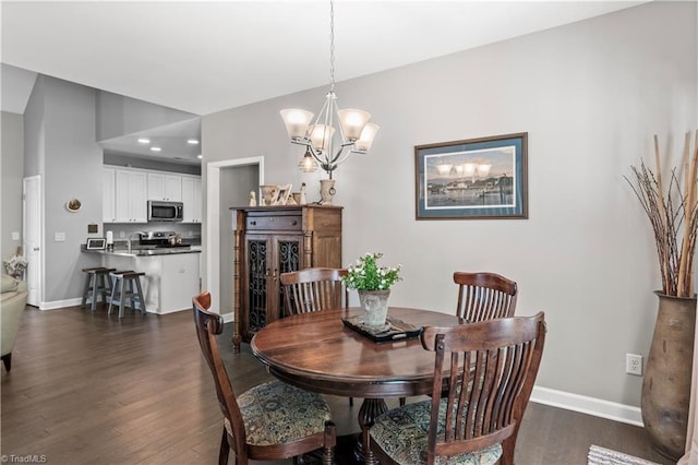 211 Hawks Nest Cir, Clemmons, NC 27012 - dining space with a chandelier, dark wood-style flooring, and recessed lighting