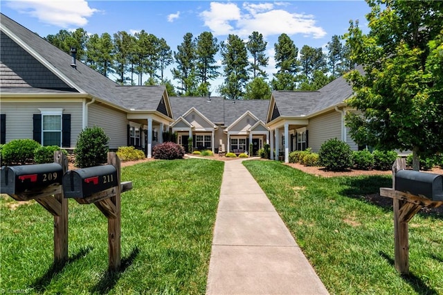 211 Hawks Nest Cir, Clemmons, NC 27012 - view of front of house with a front lawn