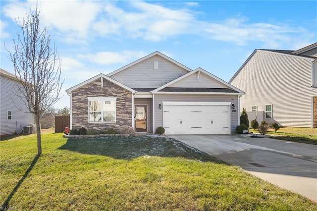 view of front of home featuring a garage, a front yard, and cooling unit