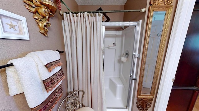 full bathroom featuring a stall shower