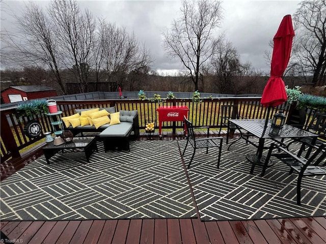 deck with an outdoor hangout area