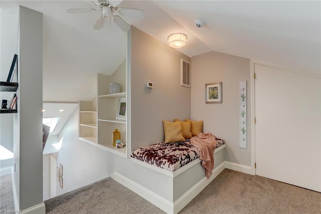 carpeted bedroom featuring a ceiling fan and lofted ceiling
