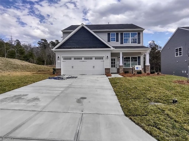 craftsman house with brick siding, a porch, concrete driveway, a front yard, and a garage