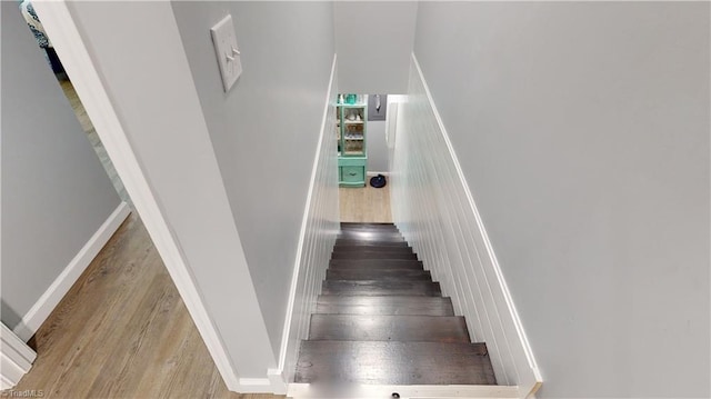 staircase featuring light hardwood / wood-style flooring