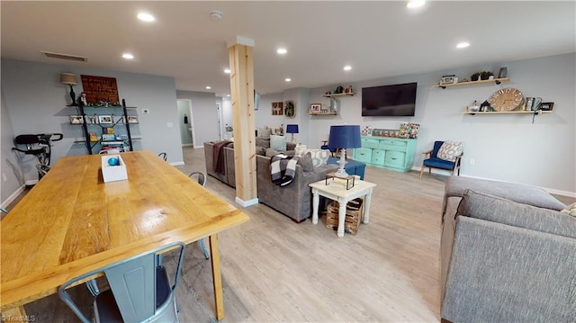 dining room with light wood-type flooring