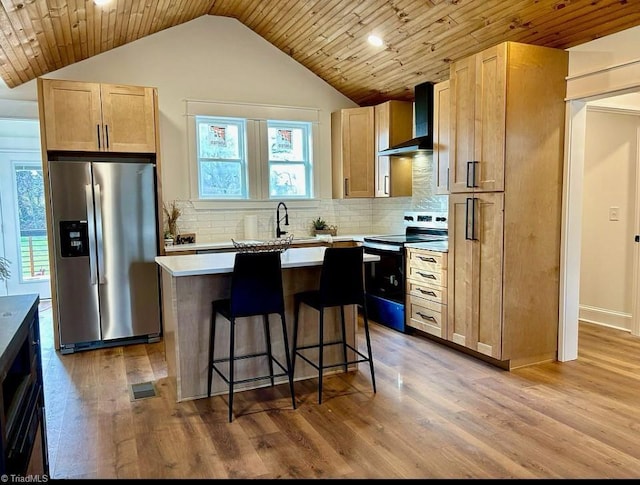 kitchen with electric range, a kitchen island, wood ceiling, stainless steel fridge with ice dispenser, and wall chimney exhaust hood