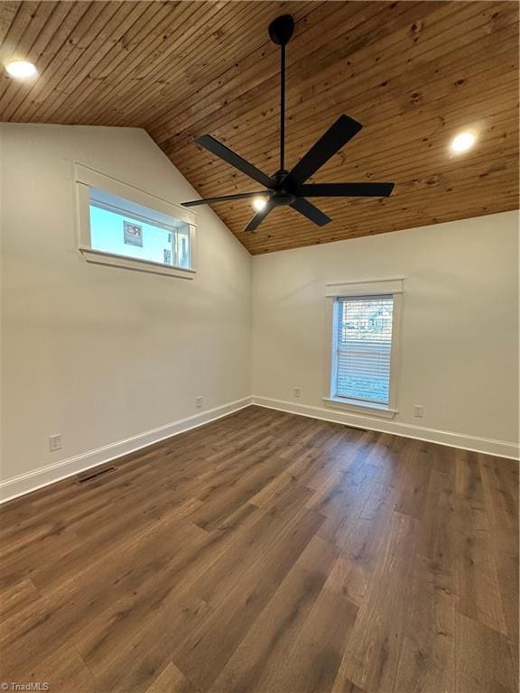 unfurnished room with wood ceiling, baseboards, vaulted ceiling, and dark wood-type flooring