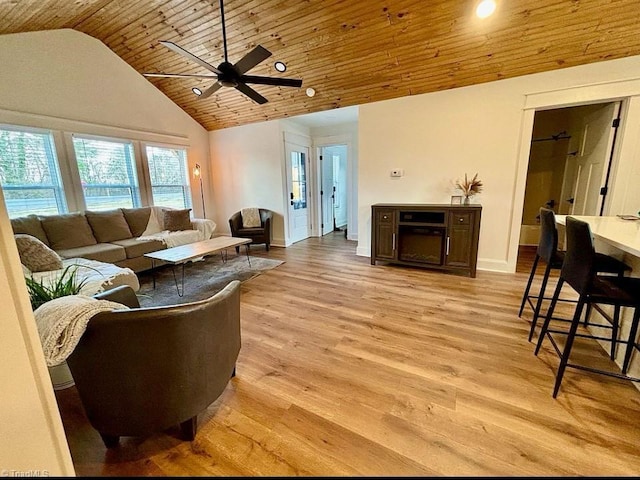 living room with wood ceiling, ceiling fan, high vaulted ceiling, light wood-type flooring, and baseboards