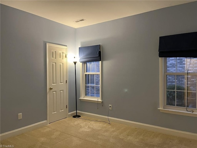 unfurnished bedroom featuring carpet flooring