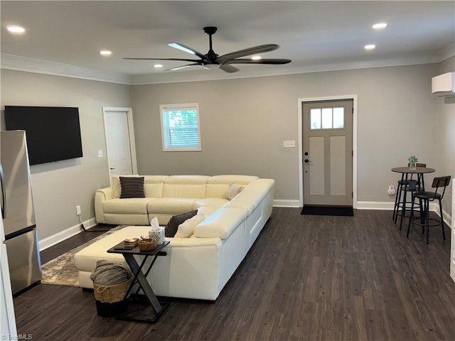 living room with ceiling fan, ornamental molding, and dark hardwood / wood-style floors