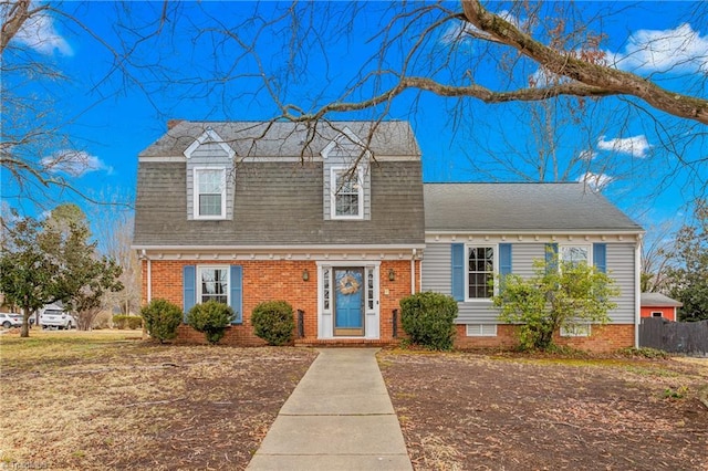 view of new england style home